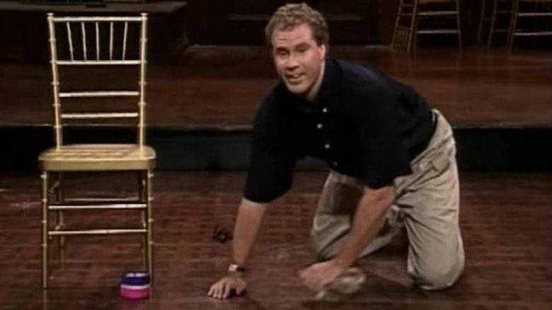 Will Ferrell plays with cat toy