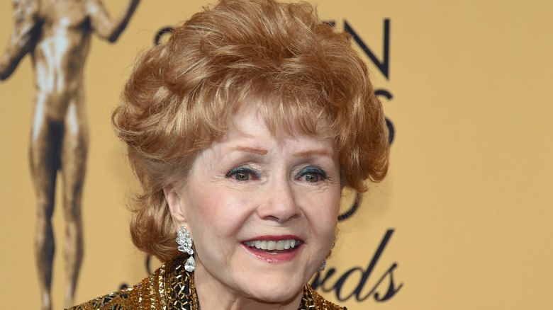 Debbie Reynolds smiles broadly