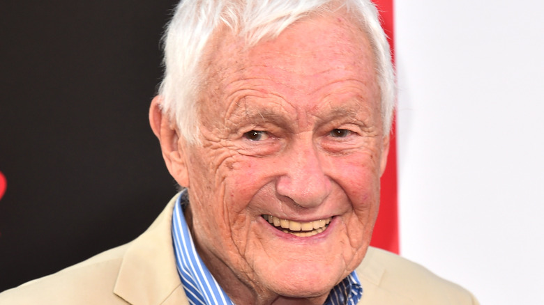 Orson Bean looks to the side while smiling