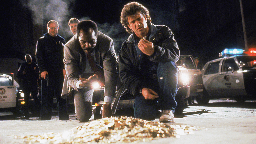 Riggs Murtaugh kneeling