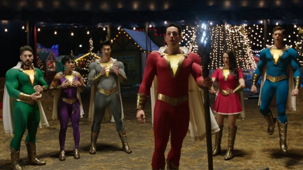 Shazam and the grown-up versions of Billy Batson's foster family in Shazam!