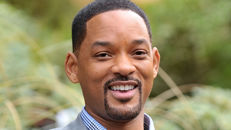 Will Smith smiling outside