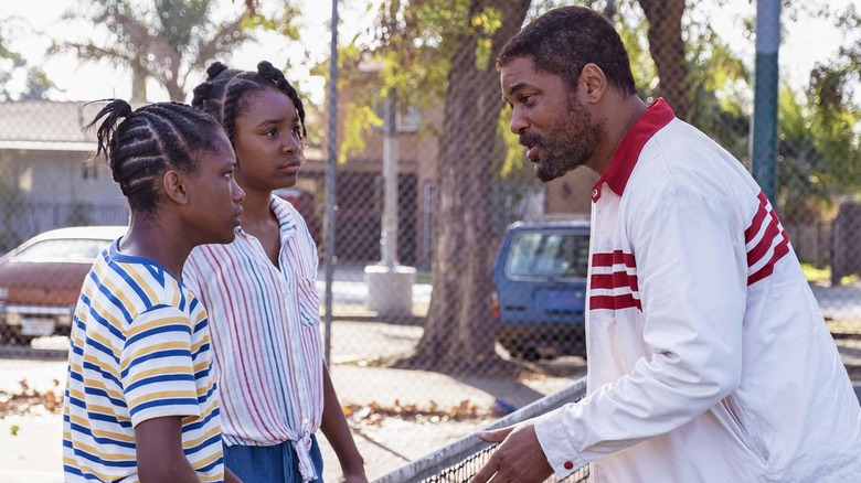 Richard Williams talking to his daughters