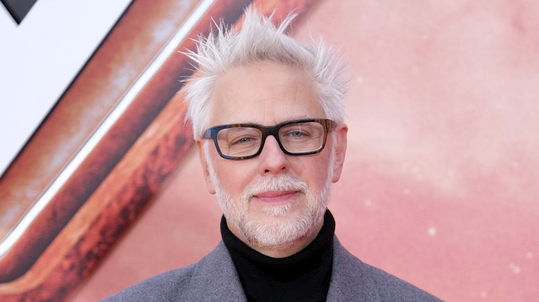 James Gunn smiling on the red carpet