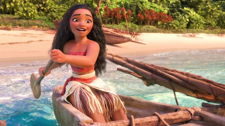 Moana paddling her boat