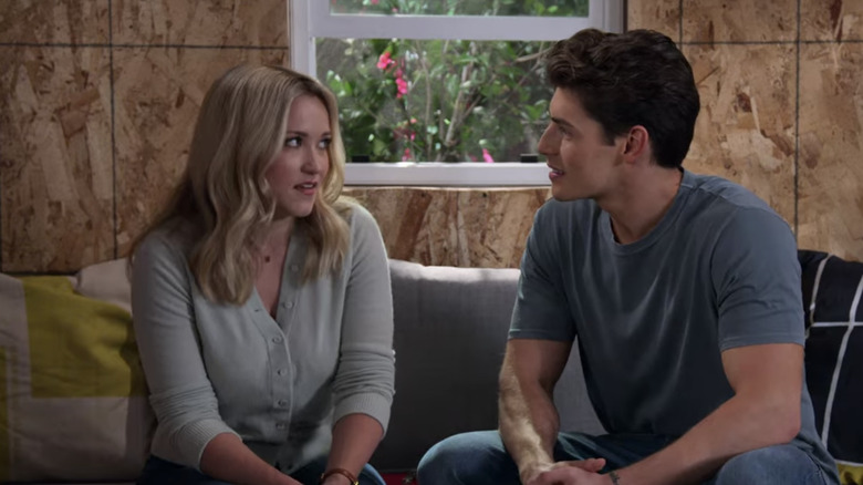 Emily Osment Greg Sulkin sitting by window