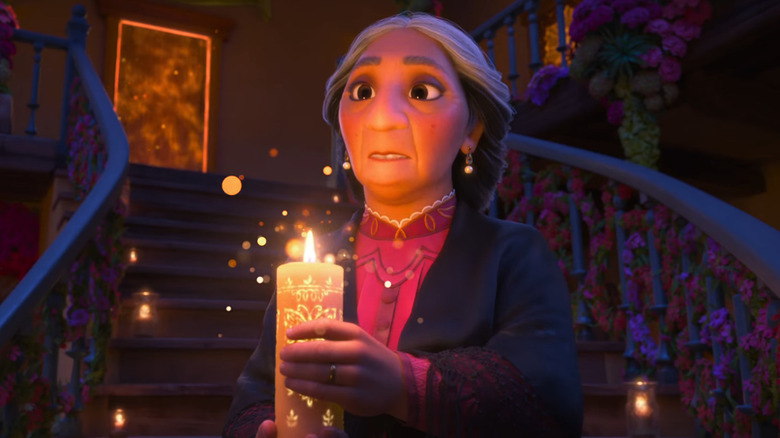 Alma holding a candle