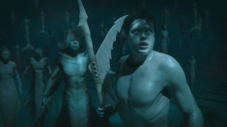 Siren merfolk carrying spears