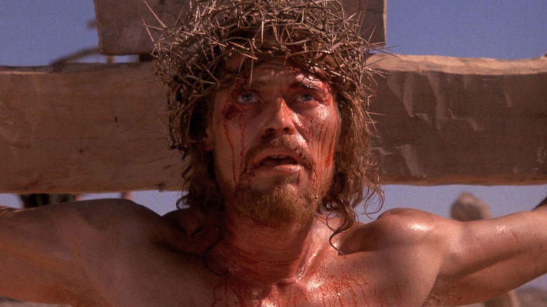 Willem Dafoe as Jesus on cross