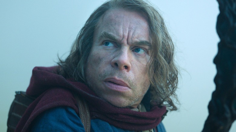 Warwick Davis looking concerned in Willow