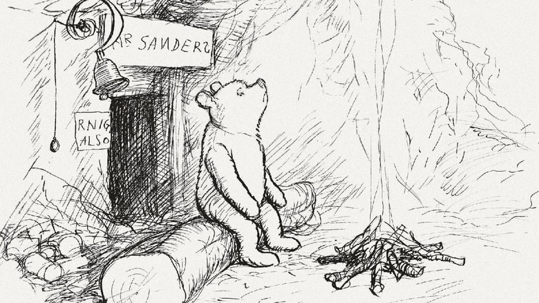 Winnie the Pooh by an open fire