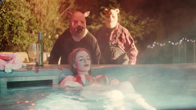 Piglet and Pooh lurking over a girl in a hot tub