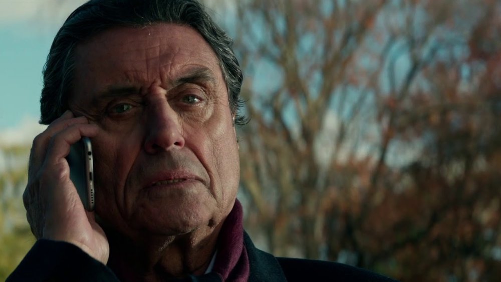 Winston (Ian McShane) make the fateful excommunicado phone call