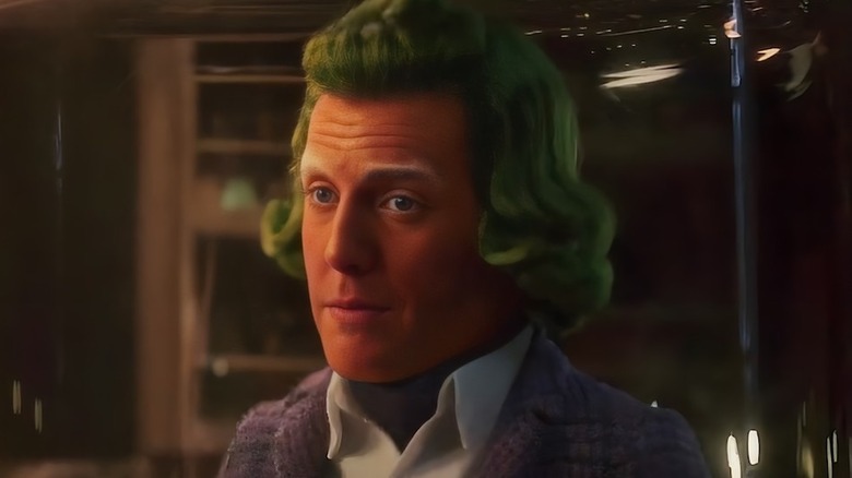 Oompa Loompa looks at Wonka