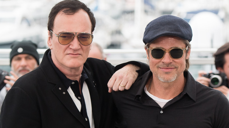 Quentin Tarantino and Brad Pitt posing