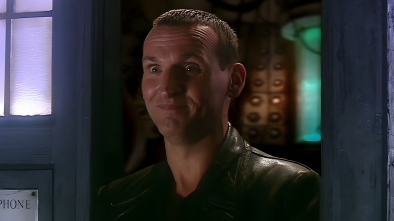 Ninth Doctor grinning uncomfortably