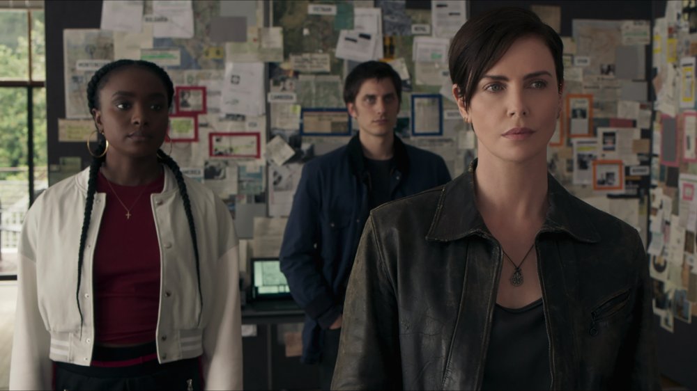 Kiki Lane as Nile, Luca Marinelli as Nicky, and Charlize Theron as Andy in The Old Guard