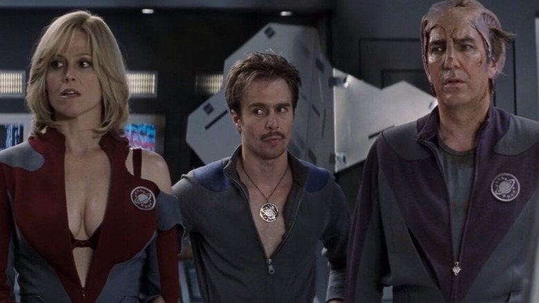 Characters from Galaxy Quest looking alarmed