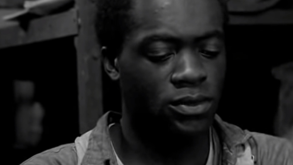 Yaphet Kotto closing eyes