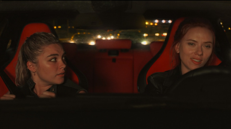 Yelena and Natasha in red car