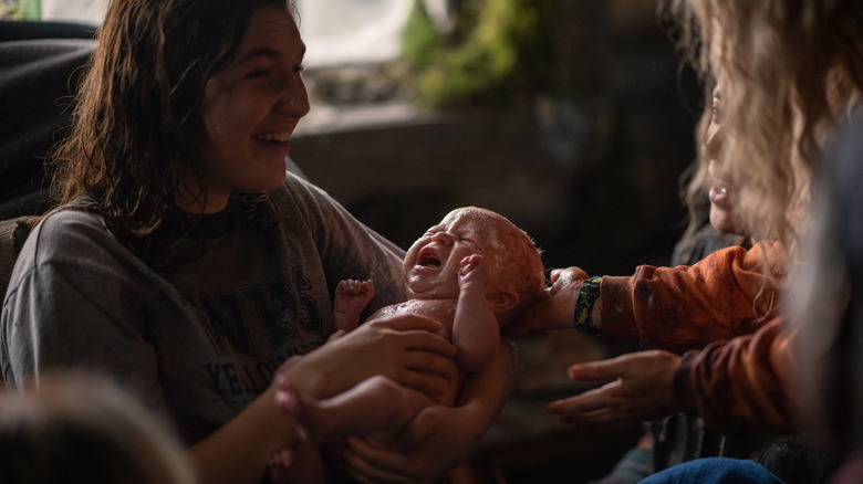 Shauna smiling at baby