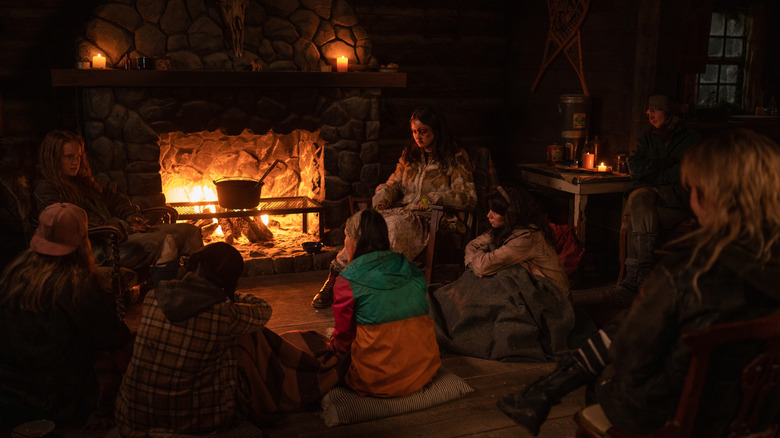 Girls sitting in cabin