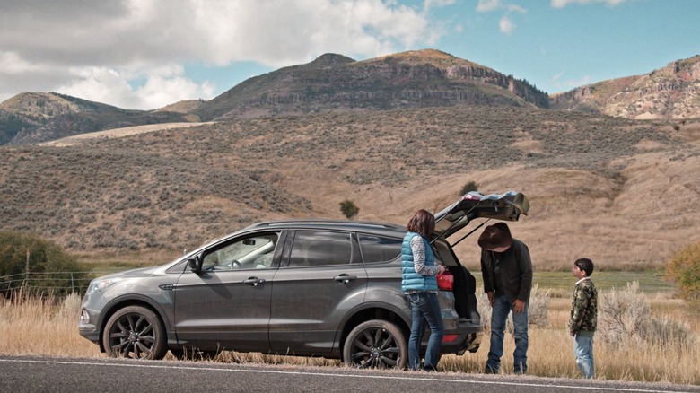 Yellowstone group checking vehicle