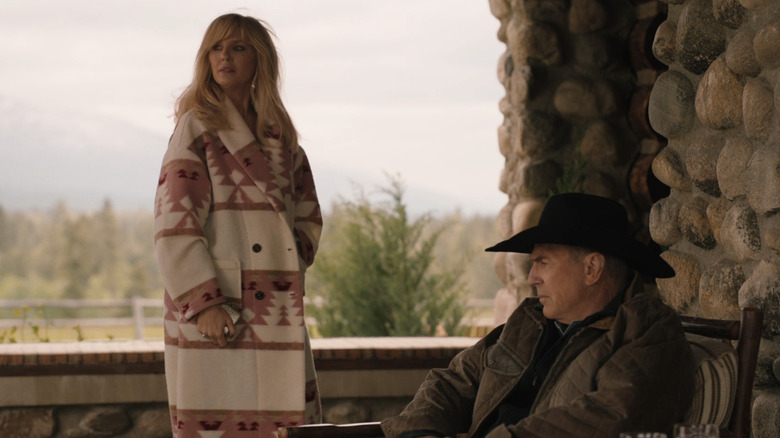 Beth Dutton stands near John