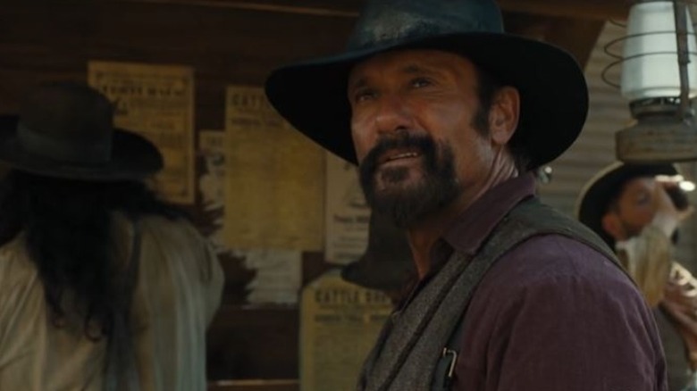 Tim McGraw wearing a hat in Yellowstone 1883