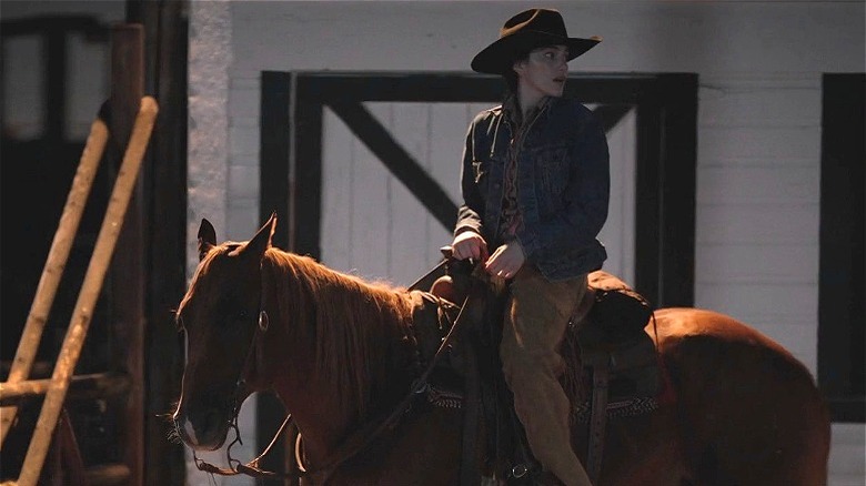 Lilli Kay riding a horses in Yellowstone