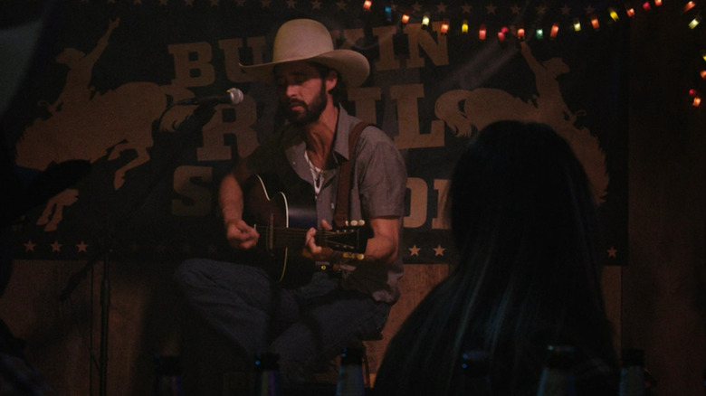 Ryan Bingham cowboy hat guitar