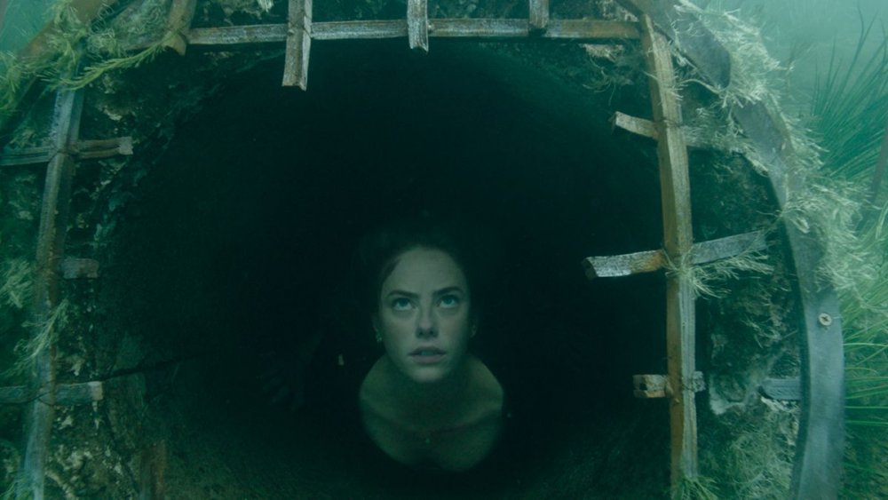 Kaya Scodelario as Haley underwater in Crawl