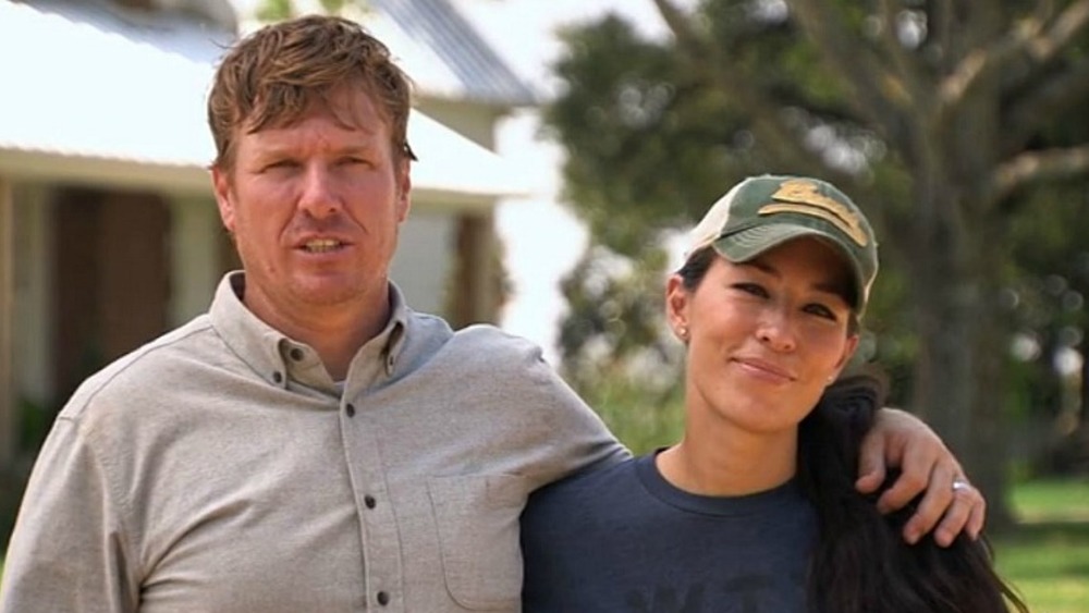 Chip and Joanna Gaines hug on Fixer Upper