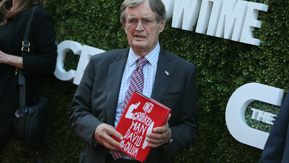 David McCallum with his book, Once a Crooked Man