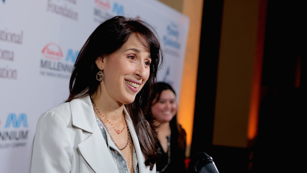 Actress Maggie Wheeler smiling