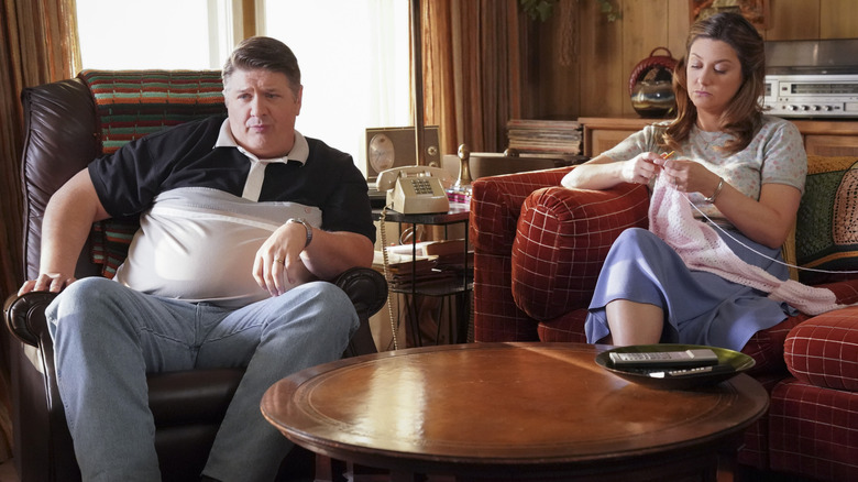 George and Mary sitting in the living room together