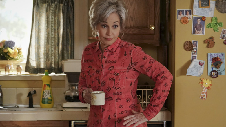 Meemaw Holding Coffee in Kitchen