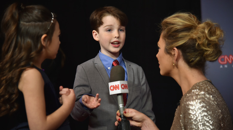 Iain Armitage being interviewed by CNN