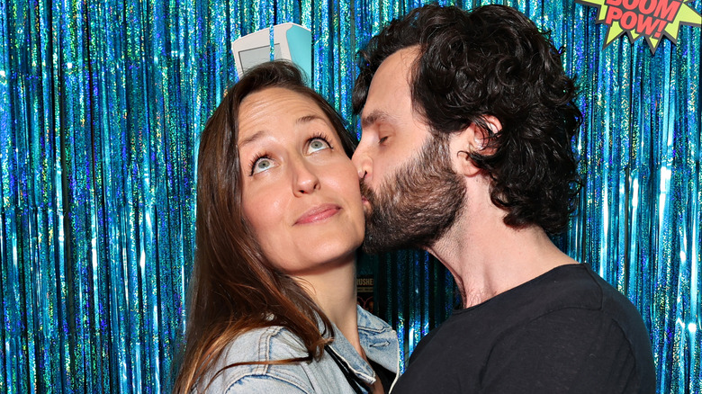 Penn Badgley kissing Domino Kirke-Badgley