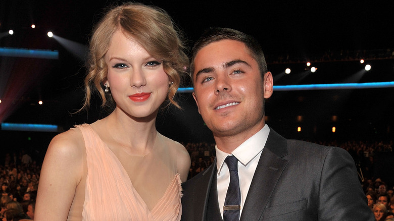 Swift and Efron at an awards show