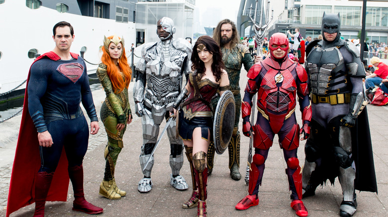 Fans dressed in Justice League costumes