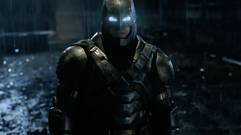 Batman standing in the rain