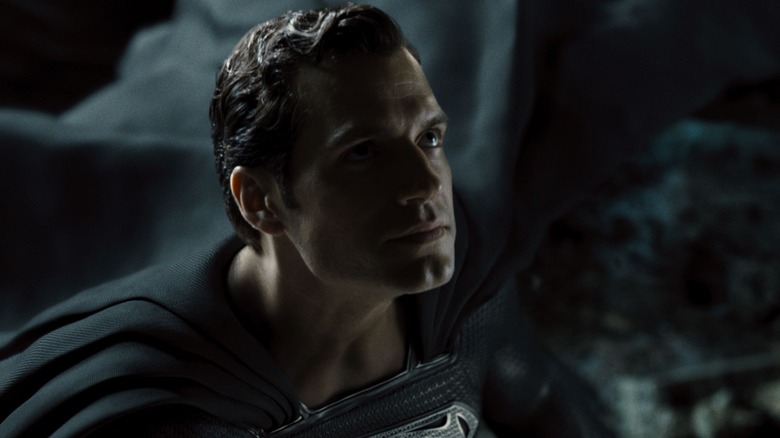 Henry Cavill in black Superman suit