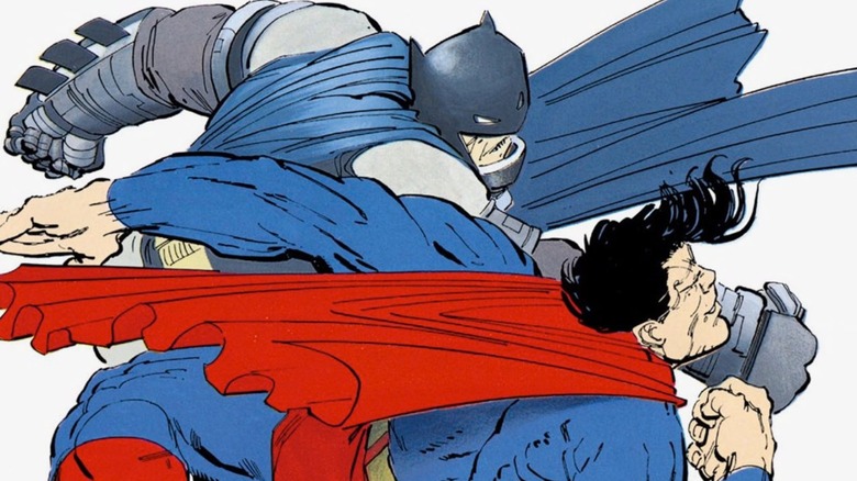 Batman punching Superman across face