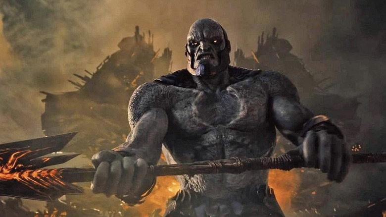 Darkseid about to smash his weapon