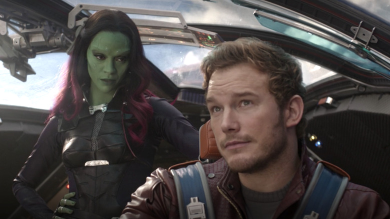 Guardians of the Galaxy Gamora stands behind Peter Quill